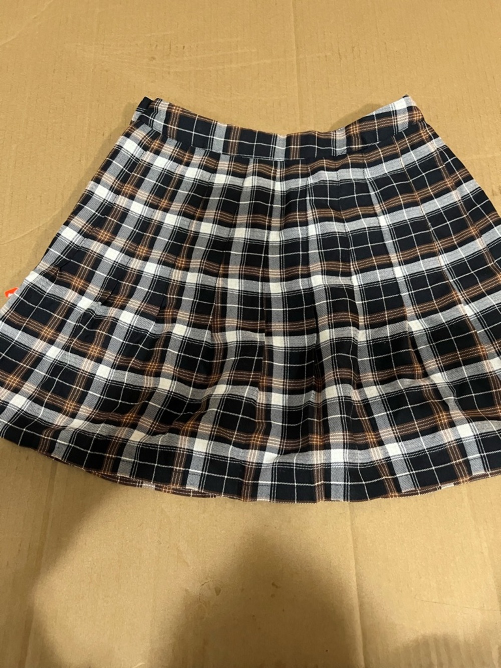 Urban Outfitters Pleated Plaid Mini Skirt in Black, White & Brown